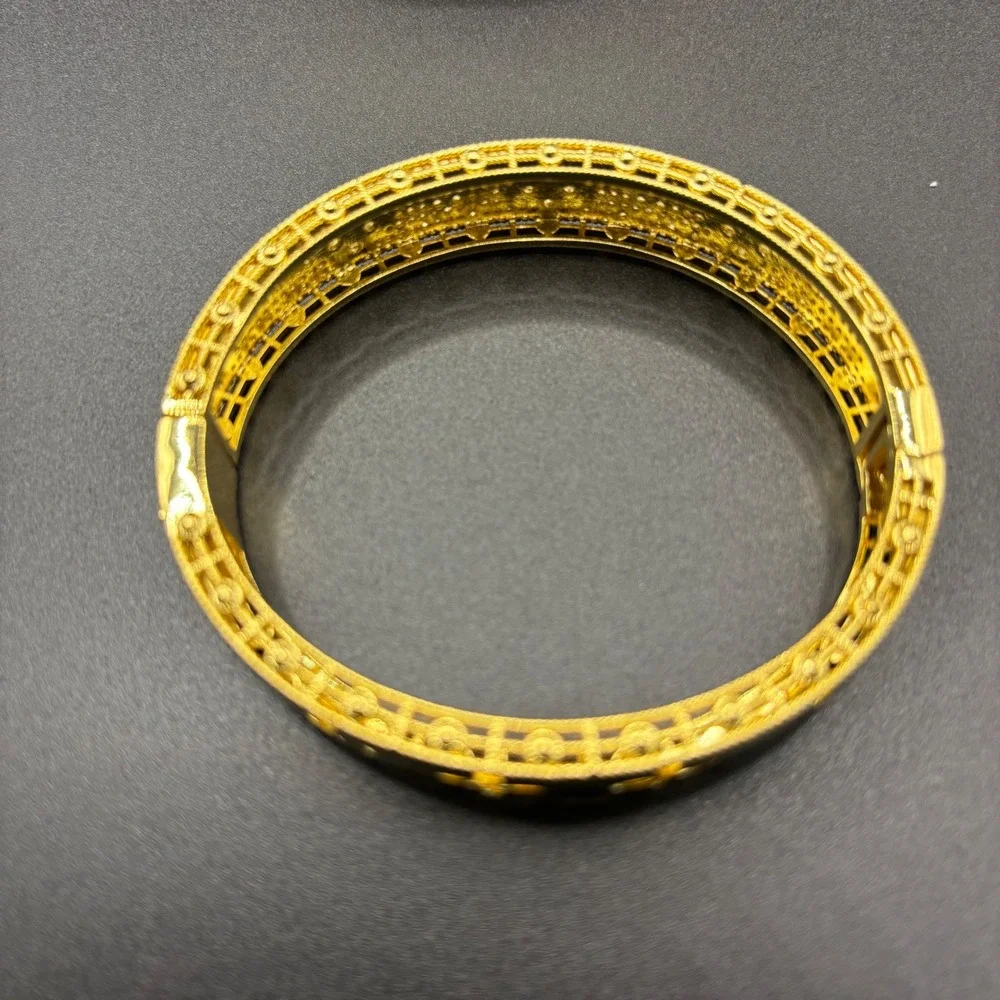 Gold Tone Crystal Pave Floral Quatrefoil Hinged Bangle Bracelet 6.75 Inch
